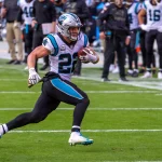 KANSAS CITY, MO - NOVEMBER 08: Carolina Panthers running back Christian McCaffrey (22) heads up field after a reception