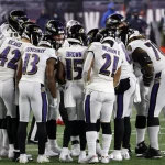 FOXBOROUGH, MA - NOVEMBER 15: The Ravens huddle up during a game between the New England Patriots and the Baltimore Rave