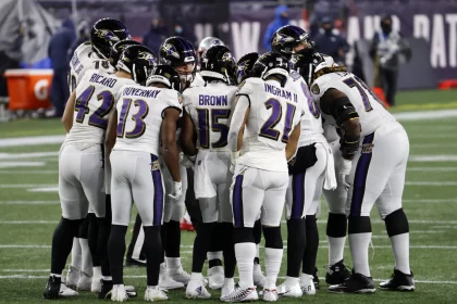 FOXBOROUGH, MA - NOVEMBER 15: The Ravens huddle up during a game between the New England Patriots and the Baltimore Rave