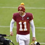 Washington entlässt Alex Smith: Washington quarterback Alex Smith (11) runs off the field during the Dallas Cowboys vs. Washi