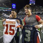 December 23, 2018 - Seattle, WA, USA - Seattle Seahawks quarterback Russell Wilson, left, and Kansas City Chiefs quarte