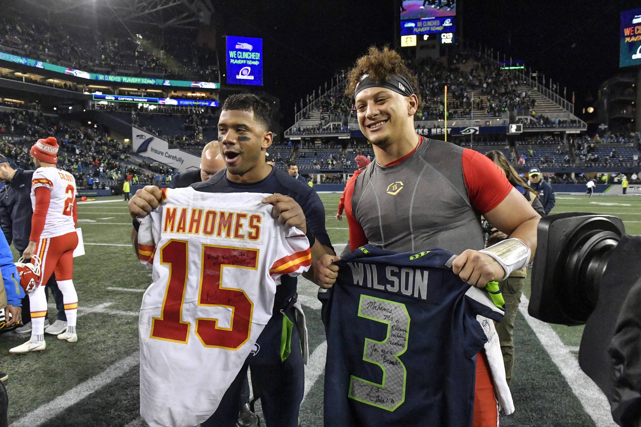 December 23, 2018 - Seattle, WA, USA - Seattle Seahawks quarterback Russell Wilson, left, and Kansas City Chiefs quarte