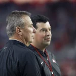 December 28, 2019 Former Ohio State coach Urban Meyer with Ohio State Buckeyes head coach Ryan Day in action during the