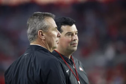 December 28, 2019 Former Ohio State coach Urban Meyer with Ohio State Buckeyes head coach Ryan Day in action during the