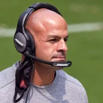 SAN FRANCISCO, CA - SEPTEMBER 13: San Francisco 49ers defensive coordinator Robert Saleh talks into his Bose radio heads