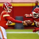 October 6, 2020, Kansas City, MO, USA: Kansas City Chiefs quarterback Patrick Mahomes makes a handoff to running back C