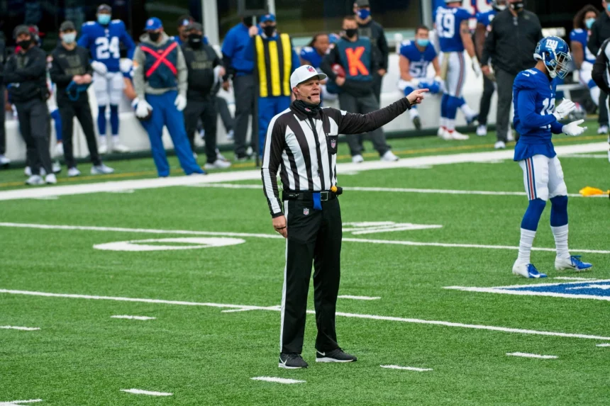EAST RUTHERFORD, NJ - NOVEMBER 15: Referee Clay Martin (19) makes a call during the game between the Philadelphia Eagles