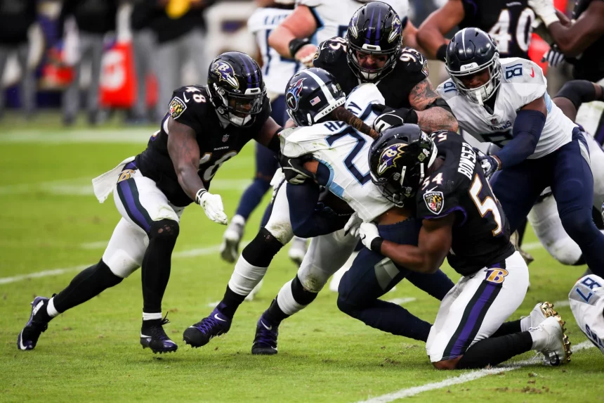 BALTIMORE, MD - NOVEMBER 22: Baltimore Ravens linebacker Tyus Bowser (54) and Baltimore Ravens defensive end Derek Wolfe