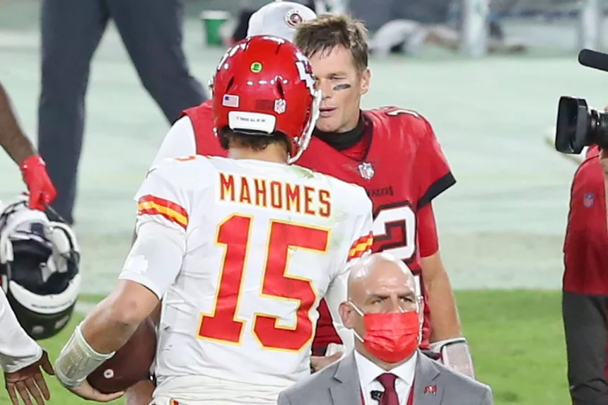 TAMPA, FL - NOVEMBER 29: Tom Brady (12) of the Buccaneers shakes hands with Patrick Mahomes (15) of the Chiefs after the
