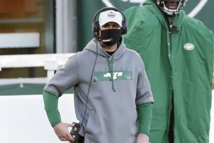 New York Jets head coach Adam Gase stands on the sidelines in the second half against the Las Vegas Raiders in week 13