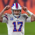 DENVER, CO - DECEMBER 19: Buffalo Bills quarterback Josh Allen (17) runs the offense against the Denver Broncos during a
