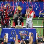 January 1, 2021: Ohio State Head Coach Ryan Day along with Offensive MVP Justin Fields (1) and Defensive MVP Tuf Borland