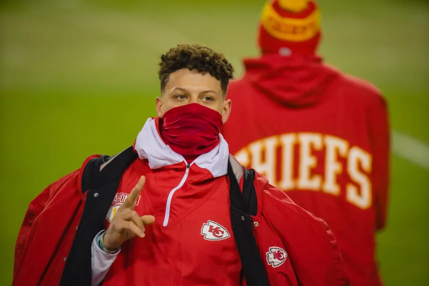 Kansas City Chiefs quarterback Patrick Mahomes (15) acknowledges the fans while resting against the Los Angeles Chargers