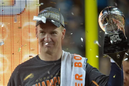 Denver Broncos quarterback Peyton Manning savors his second Lombardi trophy at Super Bowl 50 at Levi s Stadium in Santa