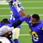 December 10, 2020, Inglewood, California, USA: Defensive end Aaron Donald 99 celebrates after teammate defensive end Mor