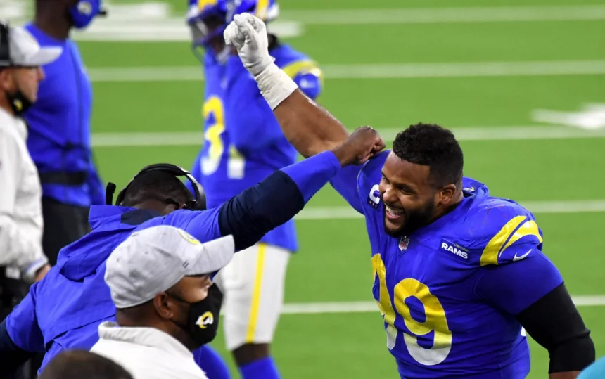 December 10, 2020, Inglewood, California, USA: Defensive end Aaron Donald 99 celebrates after teammate defensive end Mor
