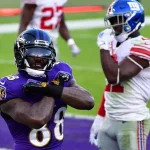 Baltimore Ravens wide receiver Dez Bryant (88) reacts after an 8-yard touchdown pass against the New York Giants during
