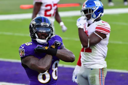 Baltimore Ravens wide receiver Dez Bryant (88) reacts after an 8-yard touchdown pass against the New York Giants during