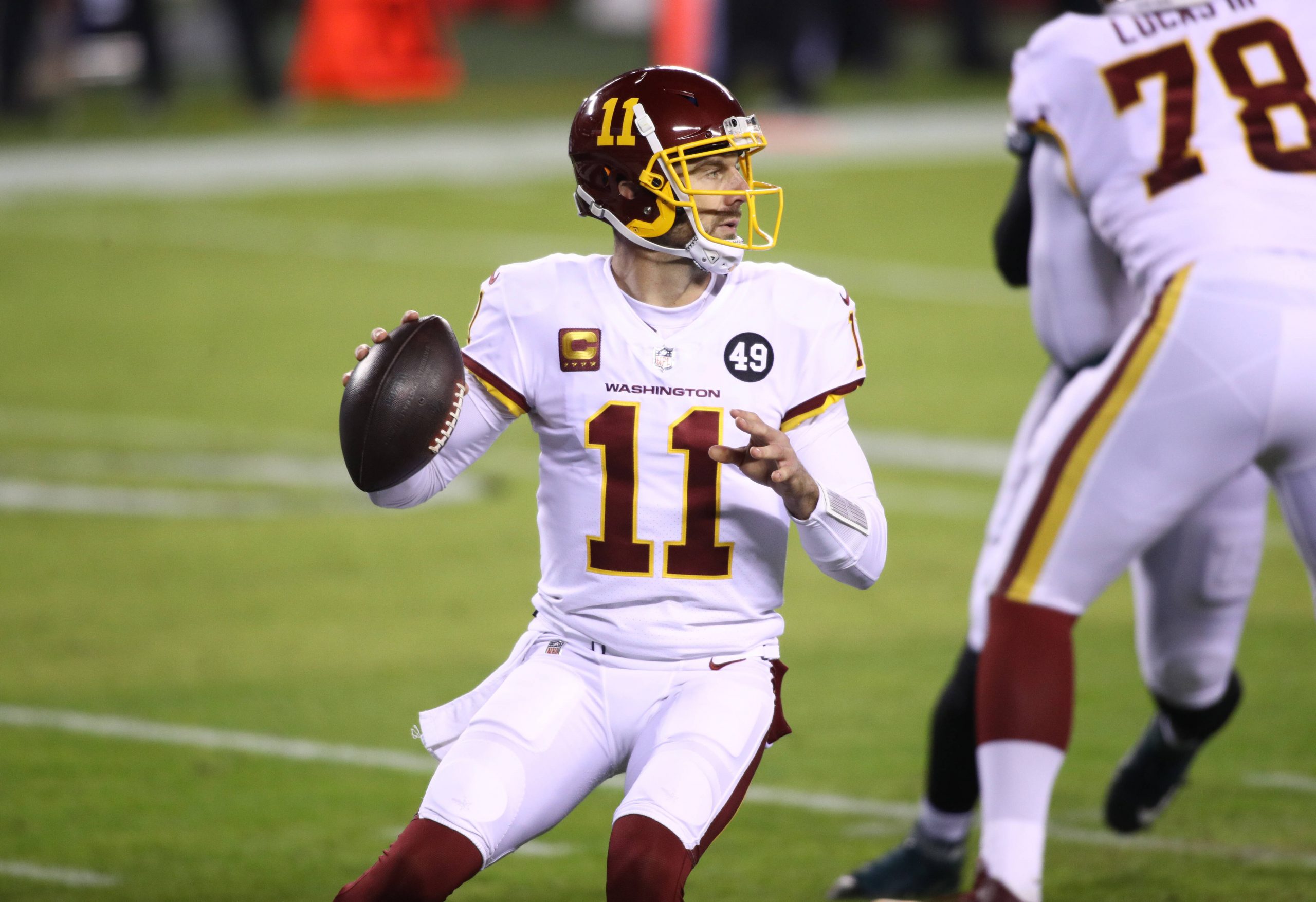 PHILADELPHIA, PA - JANUARY 03: Washington Football Team Quarterback Alex Smith (11) throws a pass in the first half duri