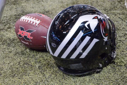 Feb 23, 2020: A New York helmet sits next to a XFL game ball in a game where the NY Guardians visit