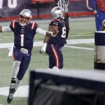 FOXBOROUGH, MA - NOVEMBER 15: New England Patriots quarterback Cam Newton (1) celebrates scoring six during a game betw