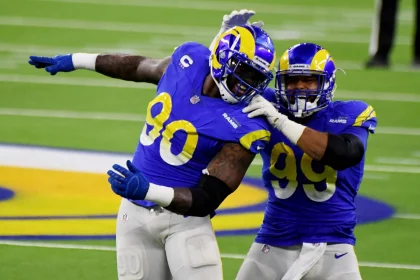 December 10, 2020, Inglewood, California, USA: Defensive end Michael Brockers 90 celebrates with teammate defensive end