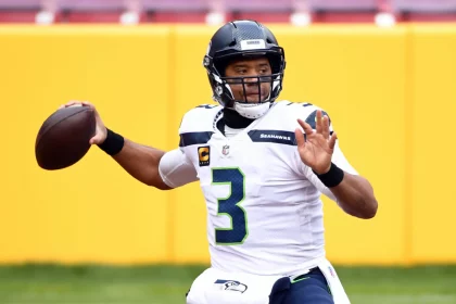 Seattle Seahawks quarterback Russell Wilson (3) looks to pass againt the Washington Football Team at FedEx Field in Lan