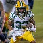 NFL Free Agents 2021 - Green Bay Packers running back Aaron Jones (33) runs with the football in action during a game