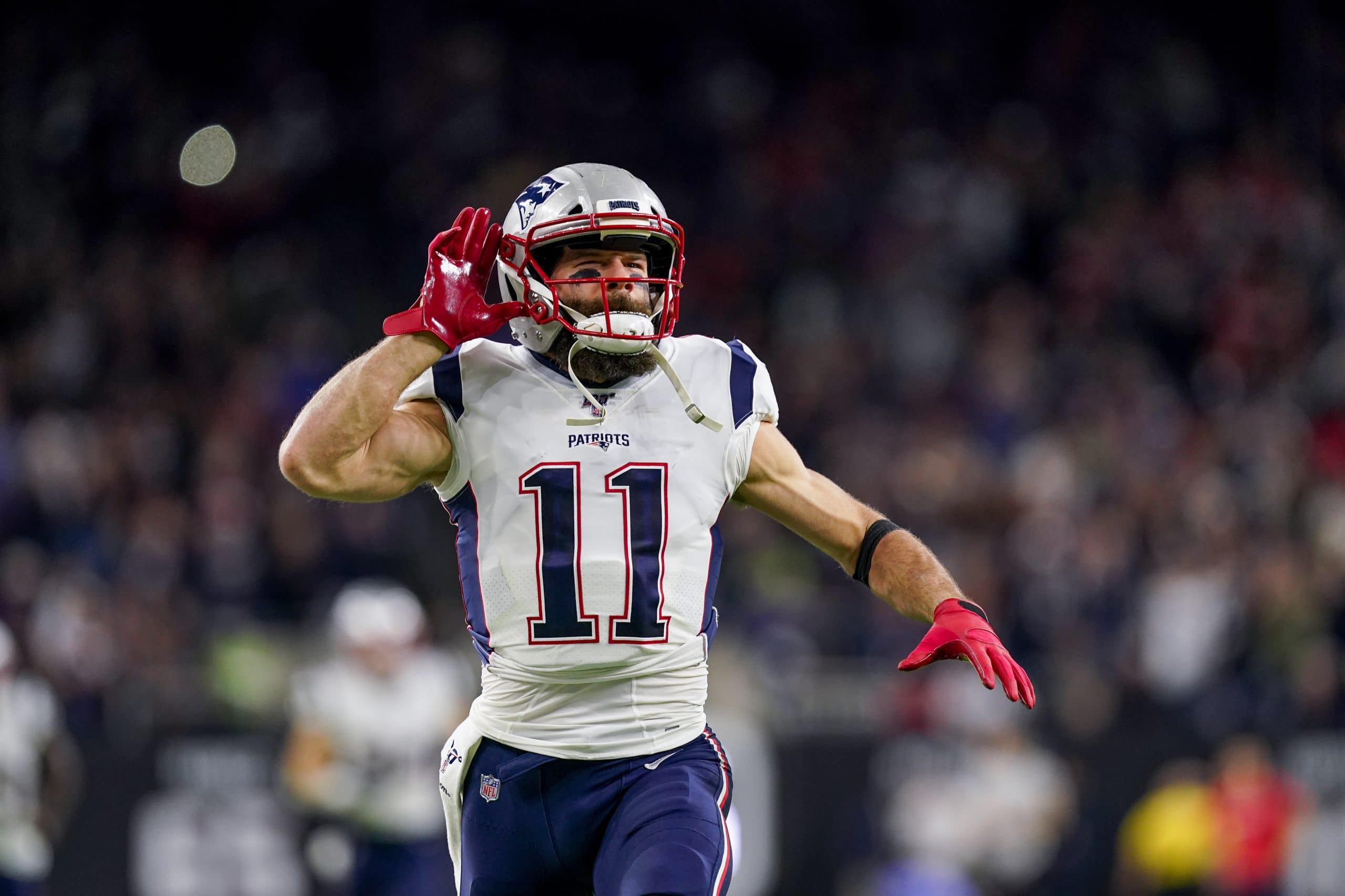 HOUSTON, TX - DECEMBER 01: New England Patriots wide receiver Julian Edelman (11) runs onto the field before the game be