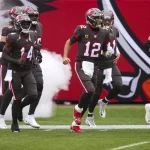 January 3, 2021, Tampa, Florida, USA: Tampa Bay Buccaneers quarterback Tom Brady (12) makes his way to the field during