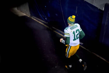 CHICAGO, IL - JANUARY 03: Green Bay Packers quarterback Aaron Rodgers (12) jogs back to the locker room after the Green