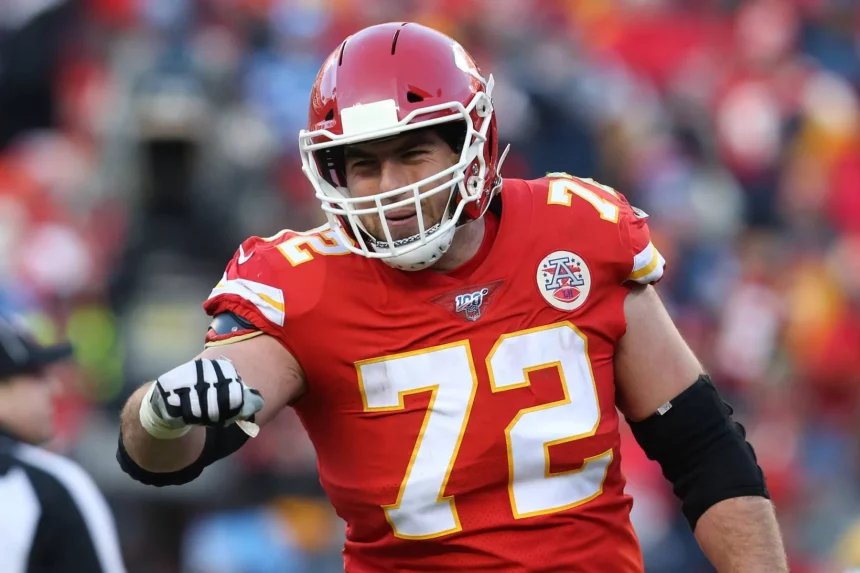 KANSAS CITY, MO - JANUARY 19: Kansas City Chiefs offensive tackle Eric Fisher (72) looks to fist bump a teammate in the
