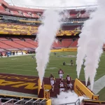 The Washington Football Team takes the field to an empty stadium for their game against the Philadelphia Eagles at FedE