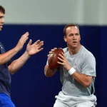 April 11, 2013 - Durham, NC, USA - Peyton Manning and his brother Eli run through drills during a wo