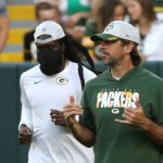 GREEN BAY, WI - AUGUST 14: Green Bay Packers quarterback Aaron Rodgers (12) comes out for the game during a game betwee