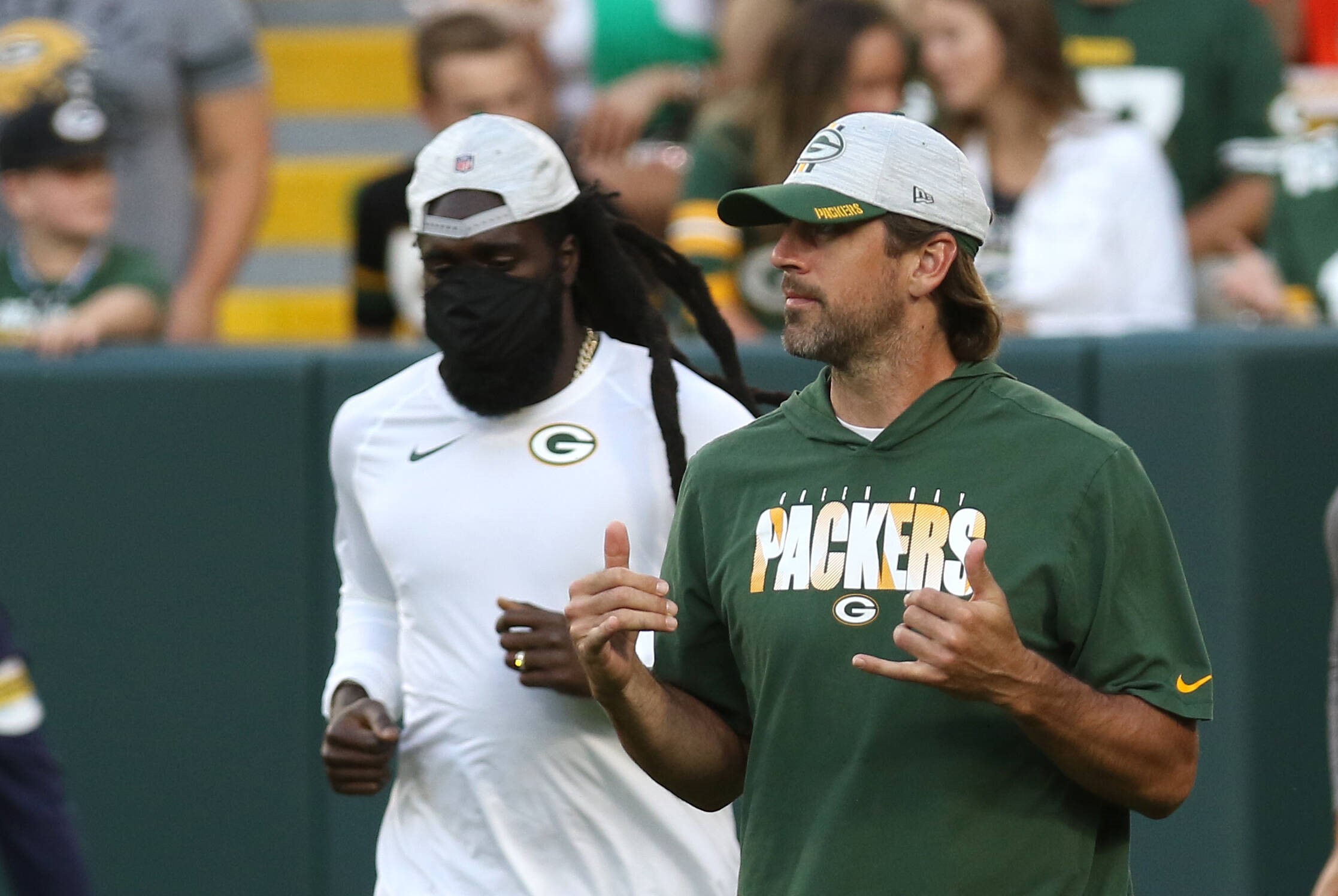 GREEN BAY, WI - AUGUST 14: Green Bay Packers quarterback Aaron Rodgers (12) comes out for the game during a game betwee