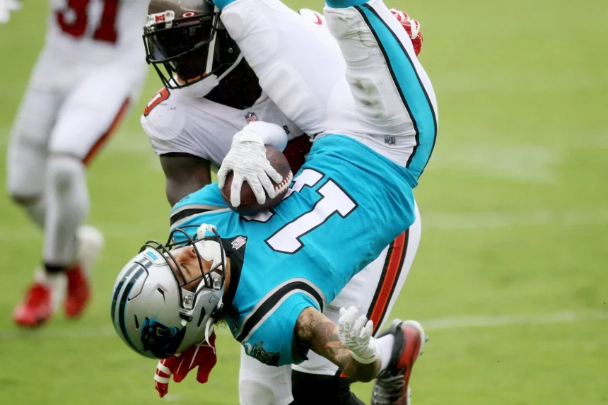 September 20, 2020, Tampa, Florida, USA: Tampa Bay Buccaneers defensive end Jason Pierre-Paul (90) tackles Carolina Pant