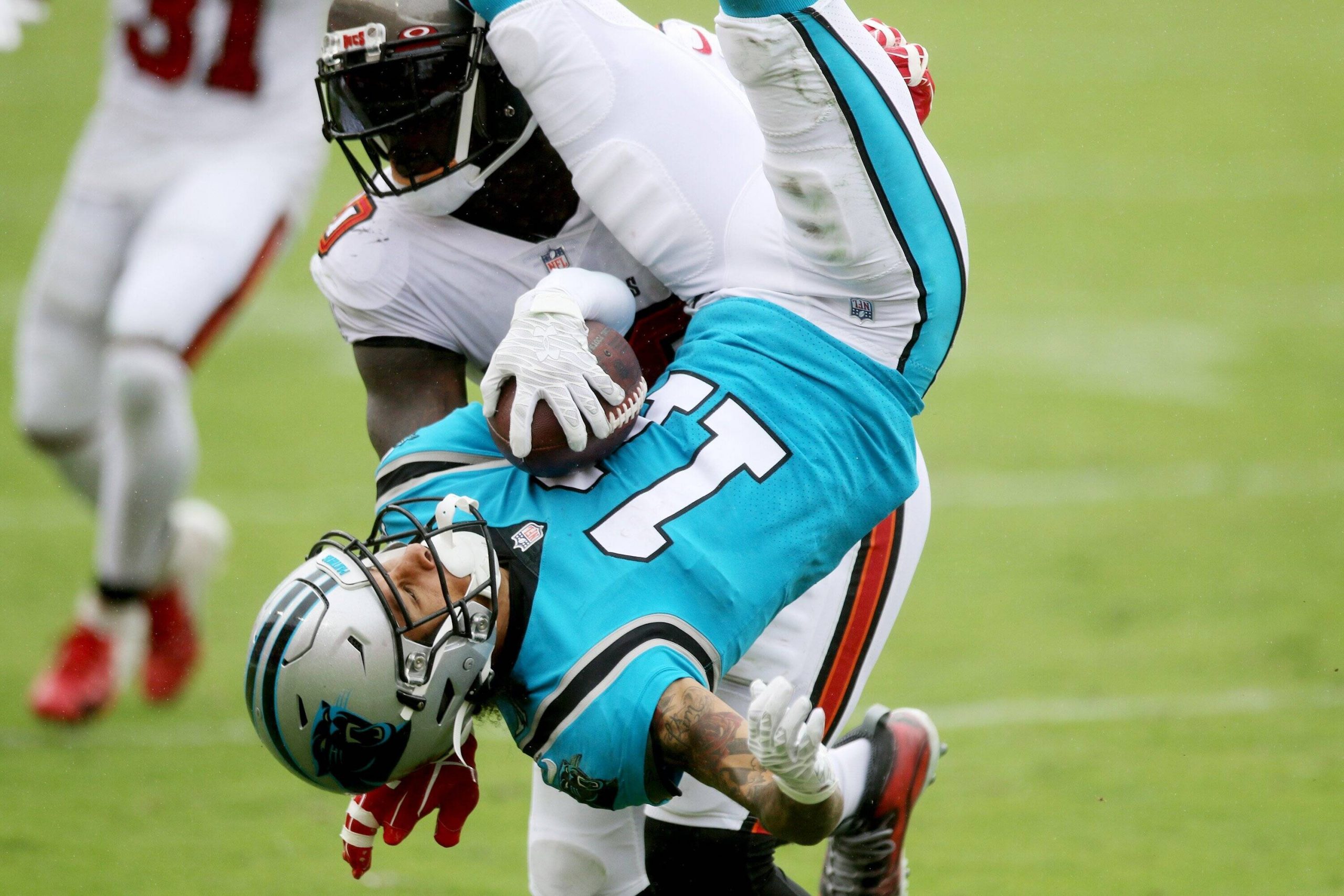 September 20, 2020, Tampa, Florida, USA: Tampa Bay Buccaneers defensive end Jason Pierre-Paul (90) tackles Carolina Pant