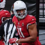 GLENDALE, AZ - SEPTEMBER 20: Arizona Cardinals wide receiver Larry Fitzgerald (11) smiles before the NFL, American Footb