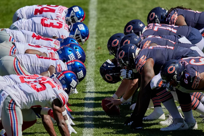 CHICAGO, IL - SEPTEMBER 20: The Chicago Bears offensive line lines up across the New York Giants defensive line at the l