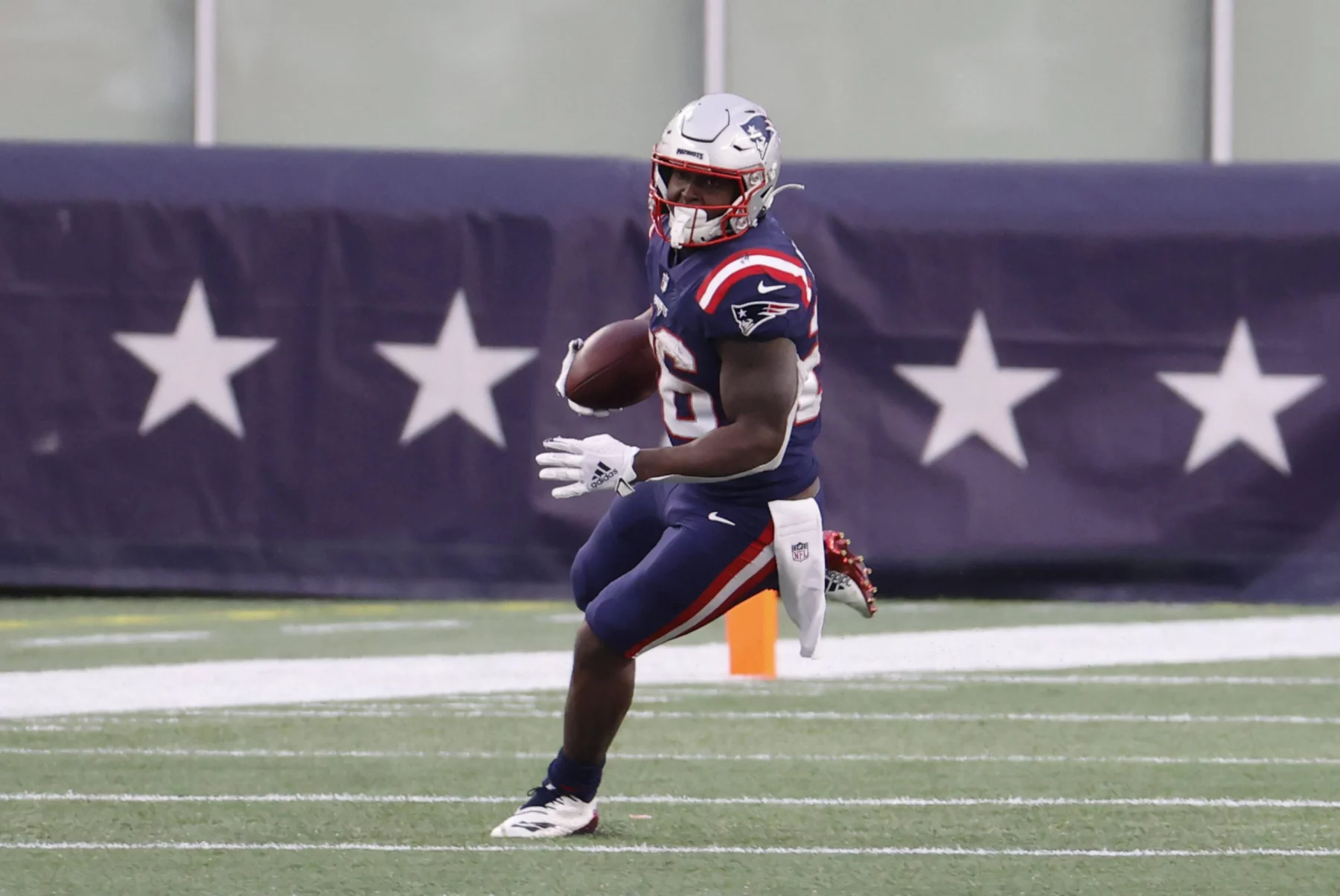 FOXBOROUGH, MA - JANUARY 03: New England Patriots running back Sony Michel (26) gets to the outside during a game betwee