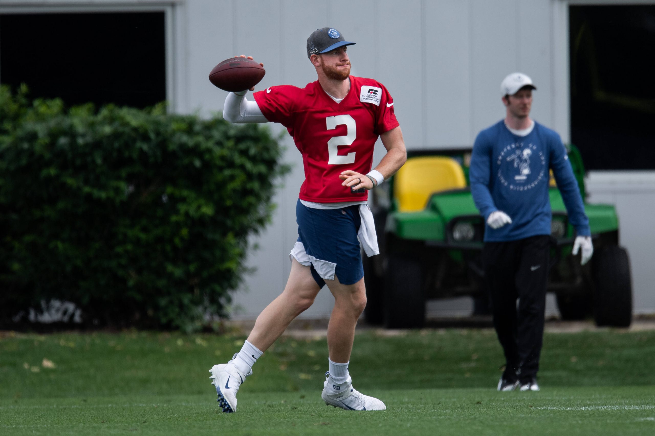 INDIANAPOLIS, IN - MAY 27: Indianapolis Colts quarterback Carson Wentz (2) runs through a drill during the Indianapolis