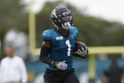 JACKSONVILLE, FL - AUGUST 03:Jacksonville Jaguars Running Back Travis Etienne Jr. (1) during training camp on August 3,
