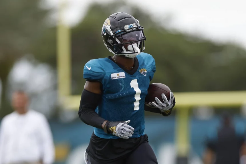 JACKSONVILLE, FL - AUGUST 03:Jacksonville Jaguars Running Back Travis Etienne Jr. (1) during training camp on August 3,
