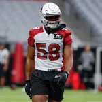 GLENDALE, AZ - AUGUST 04: Arizona Cardinals middle linebacker Jordan Hicks (58) looks on during Arizona Cardinals traini