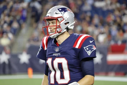 FOXBOROUGH, MA - AUGUST 12: New England Patriots quarterback Mac Jones (10) during a preseason game between the New Engl