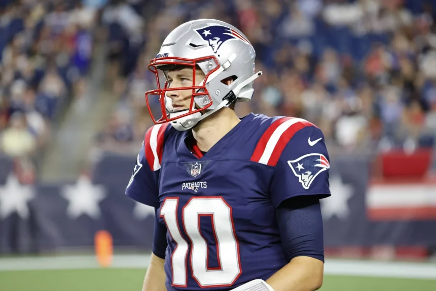 FOXBOROUGH, MA - AUGUST 12: New England Patriots quarterback Mac Jones (10) during a preseason game between the New Engl