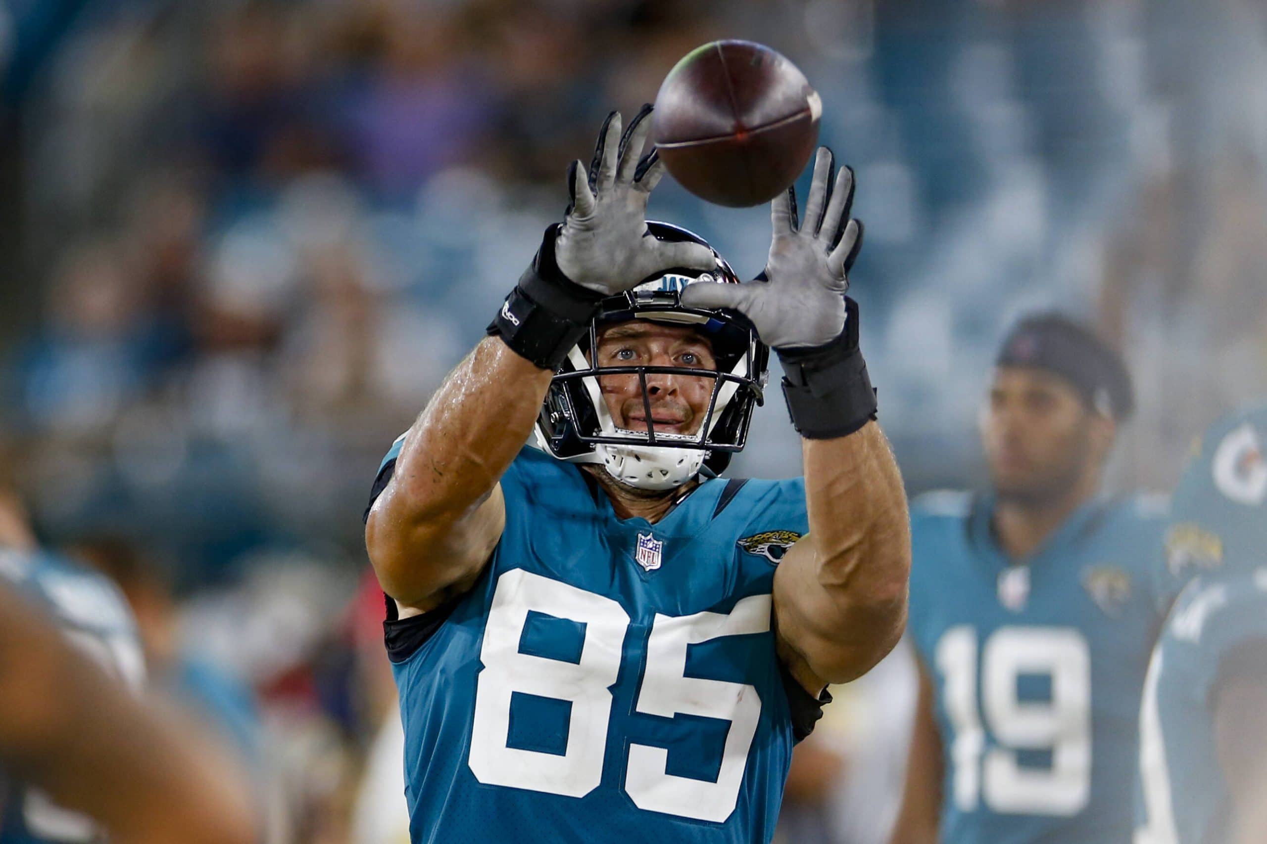 JACKSONVILLE, FL - AUGUST 14: Jacksonville Jaguars Tight End Tim Tebow (85) catches the ball on the sidelines during th