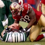 Dec. 7, 2008 - San Francisco 49ers Parys Haralson sacks New York Jets quarterback Brett Favre during