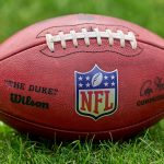 CHICAGO, IL - AUGUST 21: A detail view of the NFL, American Football Herren, USA crest logo is seen on a Wilson football